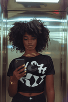 Black Eco-Friendly Love T-Shirt - Wear Kindness with bold white lettering, ideal for ethical fashion lovers seeking comfort and sustainability.