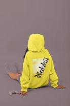 Yellow women's fleece hoodie featuring a black motivational print. Ideal eco-friendly hoodie for activewear or relaxed streetwear fashion.