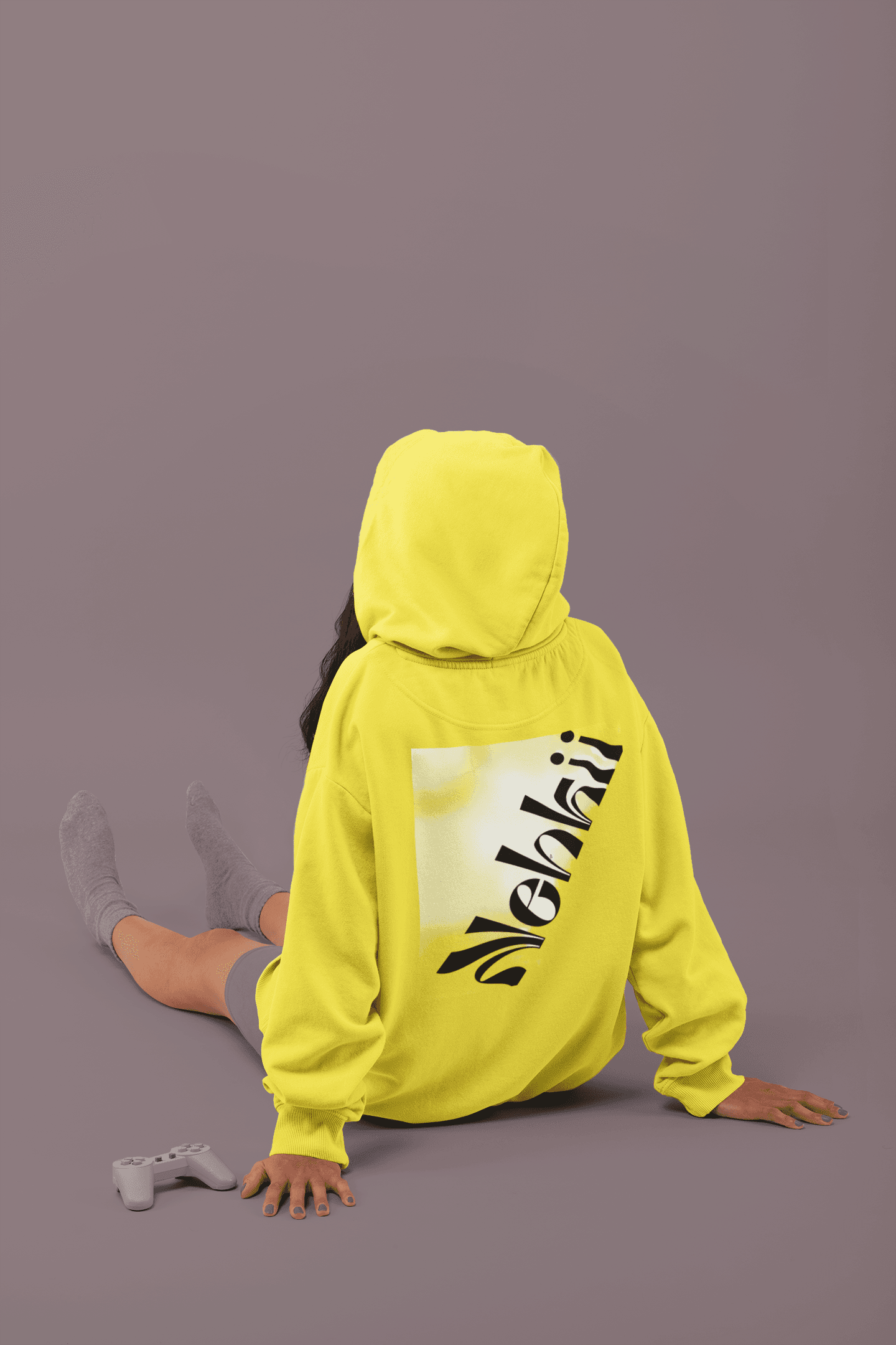Yellow women's fleece hoodie featuring a black motivational print. Ideal eco-friendly hoodie for activewear or relaxed streetwear fashion.