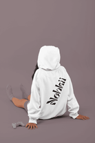 White women's fleece hoodie with sleek black motivational text. Lightweight, eco-friendly hoodie for versatile activewear and streetwear use.