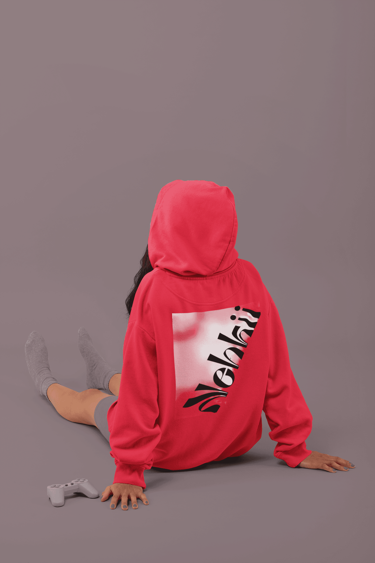 Red women's fleece hoodie with eye-catching motivational print on the back. Lightweight and sustainable, perfect for active or casual wear.