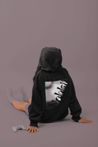 Black women's fleece hoodie with grayscale motivational print. Sustainable and cozy, perfect for layering in activewear or casual outfits.