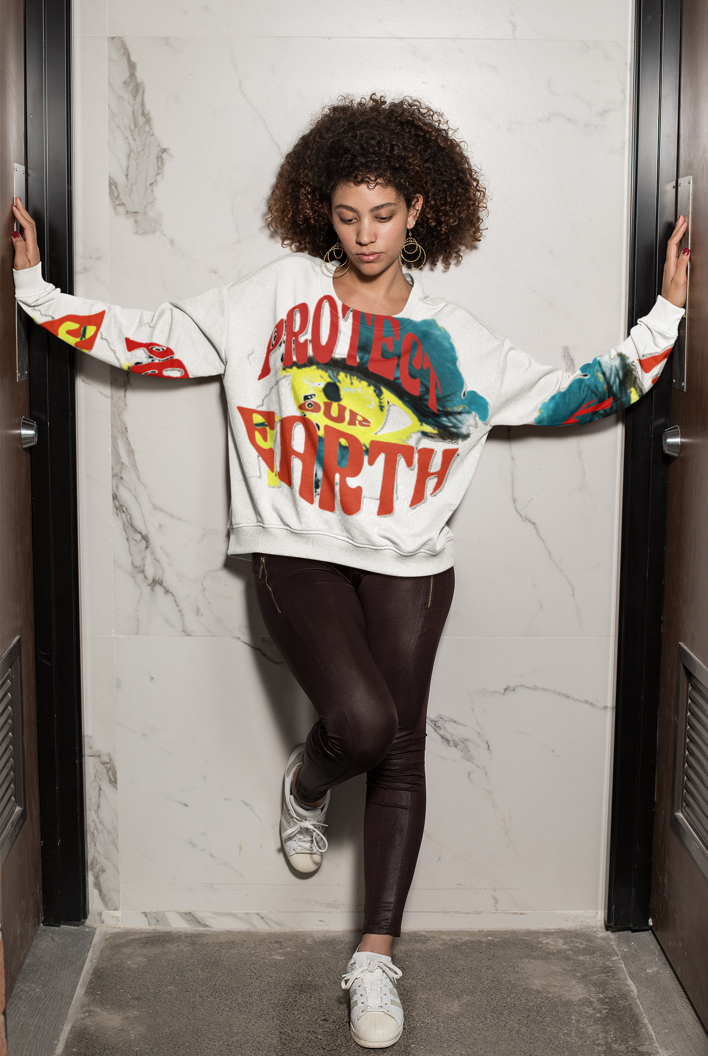 Eco Cotton Women's Sweatshirt in white with 'Protect Our Earth' graphic, offering sustainable warmth and comfort in casual streetwear style.