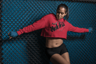 Women's Graphic Hoodie - Bold Style Fierce Spirit in red, cropped fit with bold black text, designed for confident, athletic-inspired looks.
