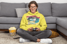 Yellow Awakening Hoodie for Men with bold eye artwork and eco-conscious message. Crafted from 100% cotton for sustainable style.