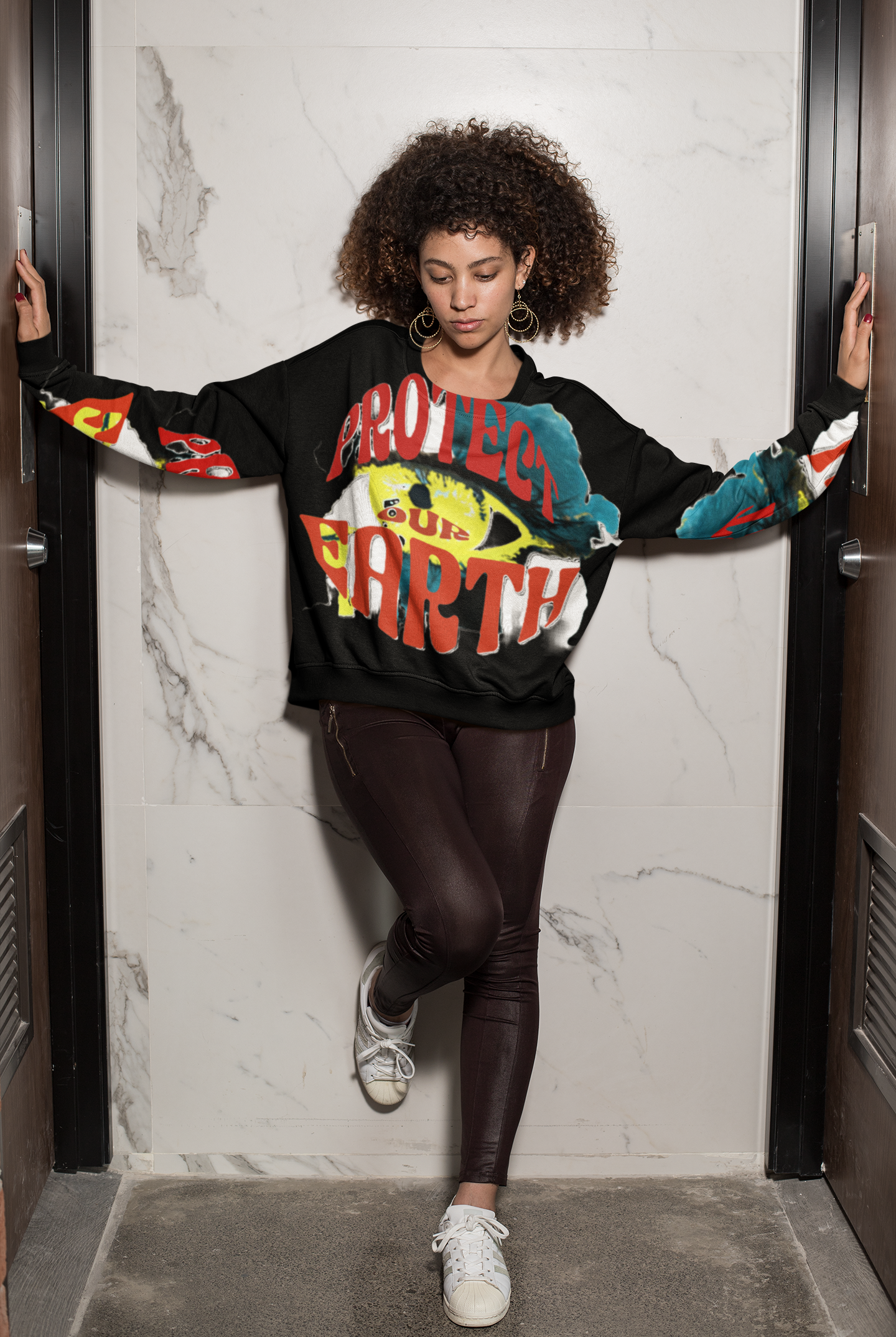 Black Eco Cotton Women's Sweatshirt featuring 'Protect Our Earth' design, crafted for warmth, sustainability, and modern eco-style appeal.