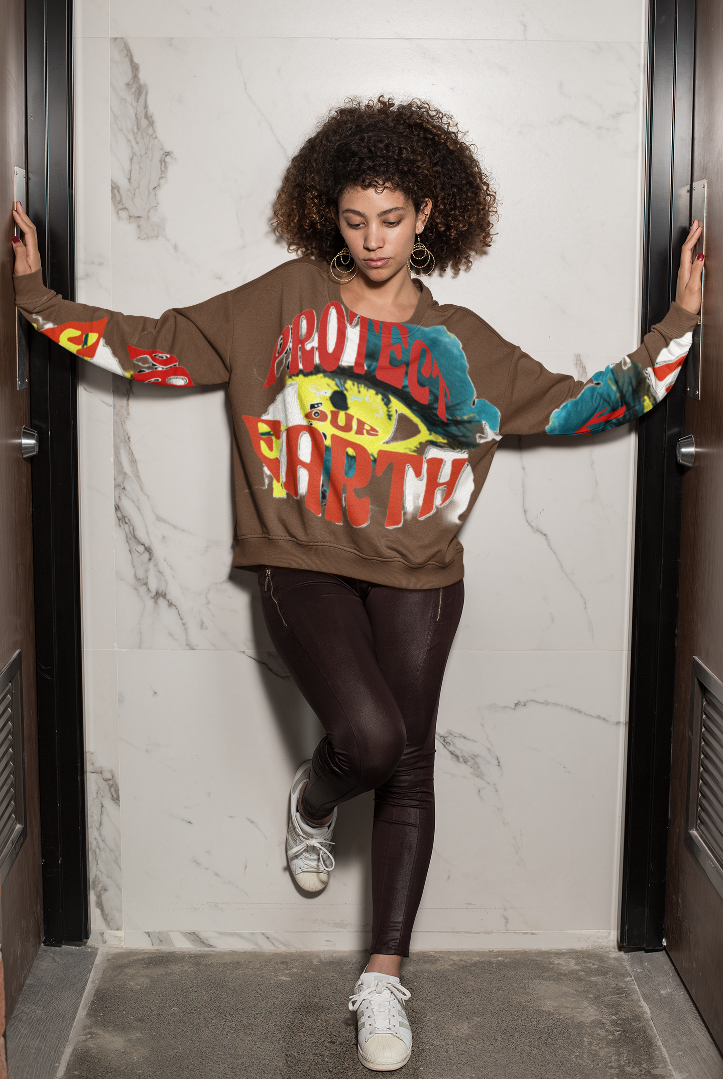 Brown Eco Cotton Women's Sweatshirt with colorful Earth graphic, designed for eco-friendly warmth and timeless sustainable fashion.