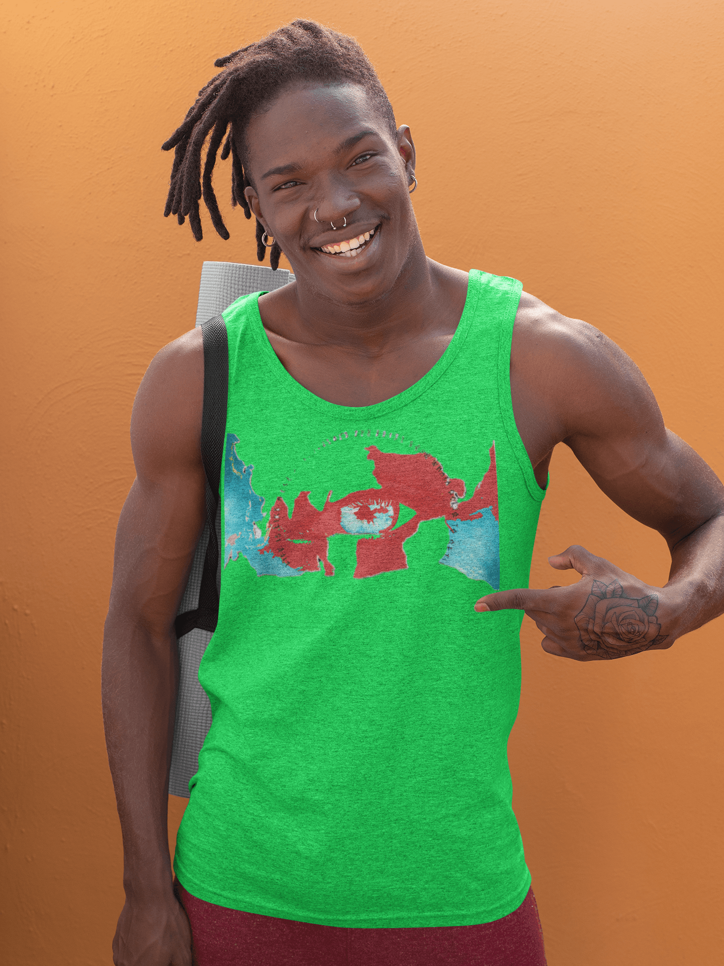 Green eco-friendly men's tank top with bold eye and map artwork, made from breathable cotton for planet-safe summer comfort.
