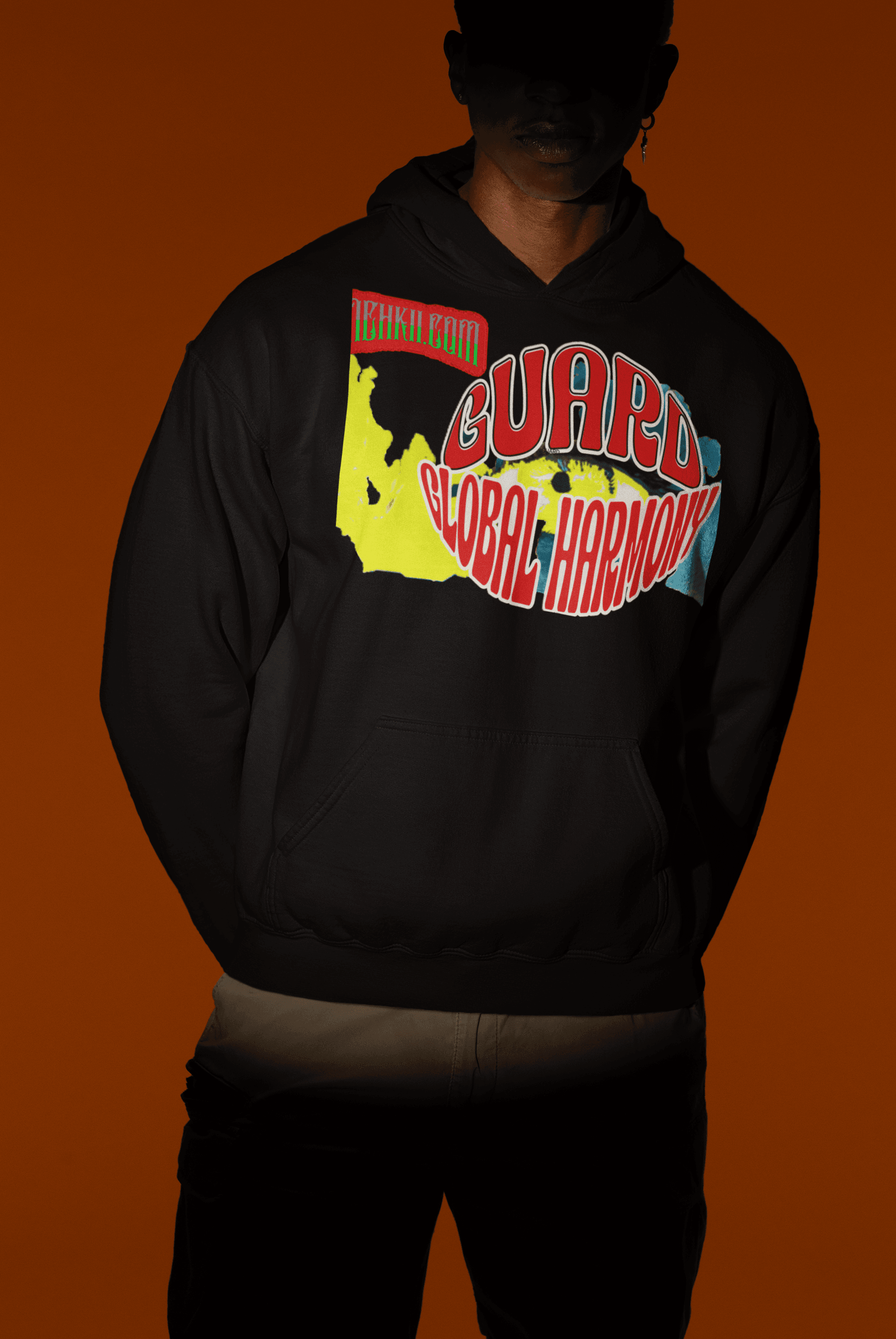 Black sustainable cotton women’s crop hoodie featuring bold 'Guard Global Harmony' print, ideal for eco-conscious streetwear style.