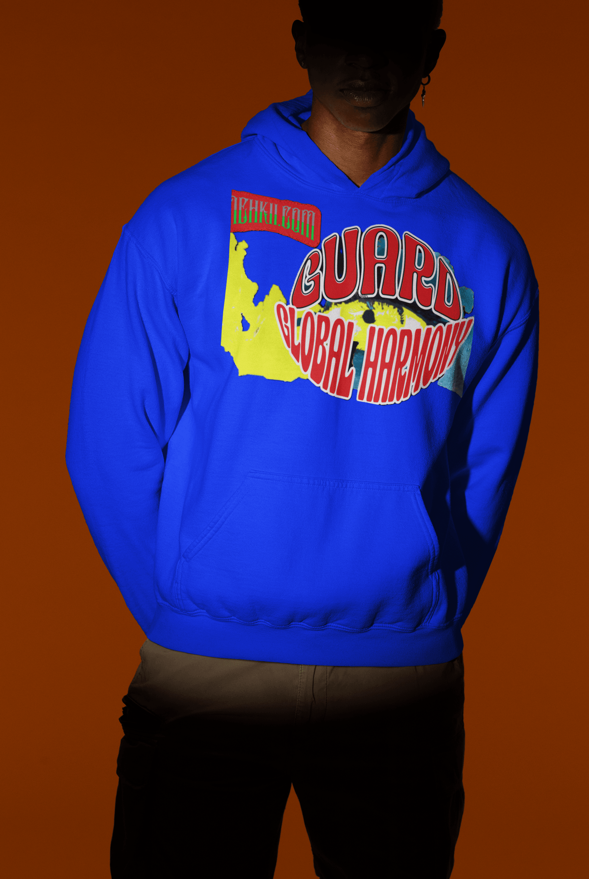 Bright blue eco-friendly women’s crop hoodie made from 100% cotton, showcasing 'Guard Global Harmony' graphic for sustainable fashion.