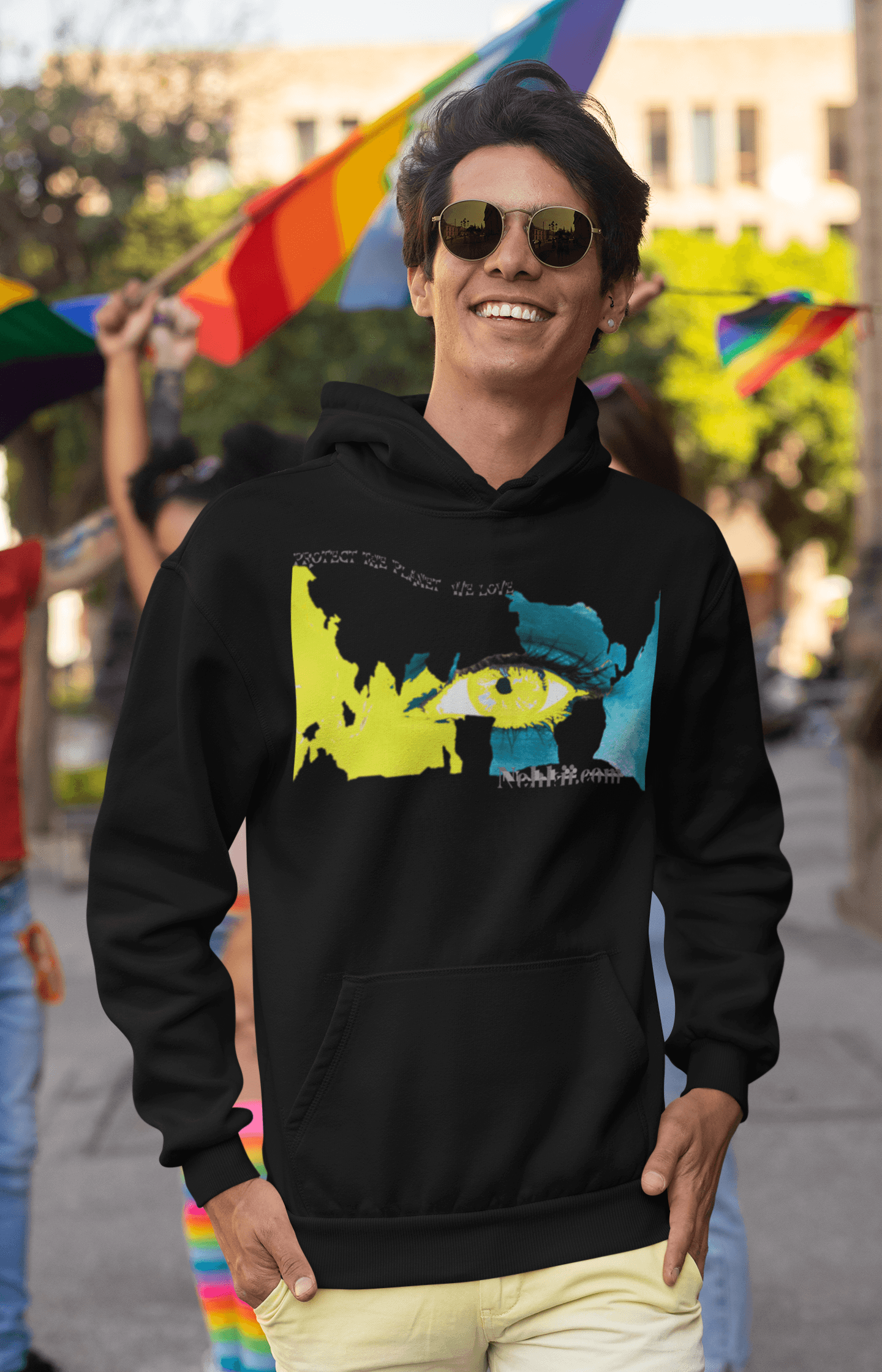 Men’s black soft eco-friendly cotton hoodie featuring bold eye and planet design, ideal for eco-conscious fashion lovers.