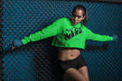 Women's Graphic Hoodie - Bold Style Fierce Spirit in neon green, cropped hoodie with statement print, ideal for standout activewear fashion.