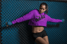Women's Graphic Hoodie - Bold Style Fierce Spirit in purple, cropped hoodie with graphic print, combining comfort and edgy streetwear appeal.