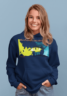 Navy blue Women’s Prove Strong Hoodie showcasing colorful eye artwork and inspiring slogan. Perfect blend of comfort and motivation.