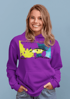 Purple Women’s Prove Strong Hoodie with expressive eye print and silent voice quote. Empowering fashion for everyday wear.