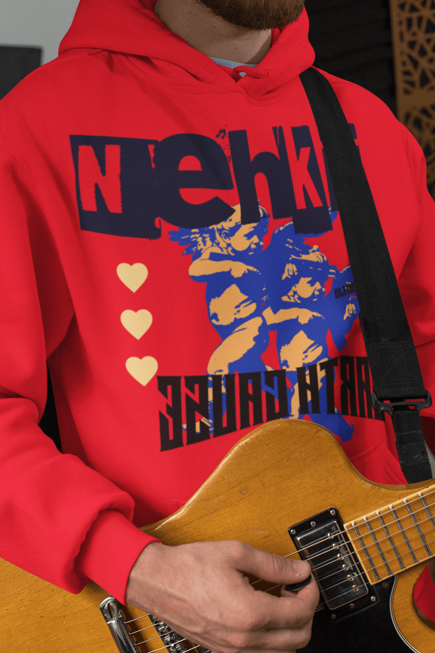 Red men's hoodie made from eco-friendly cotton, featuring a bold graphic print and heart icons, perfect for sustainable streetwear fashion.