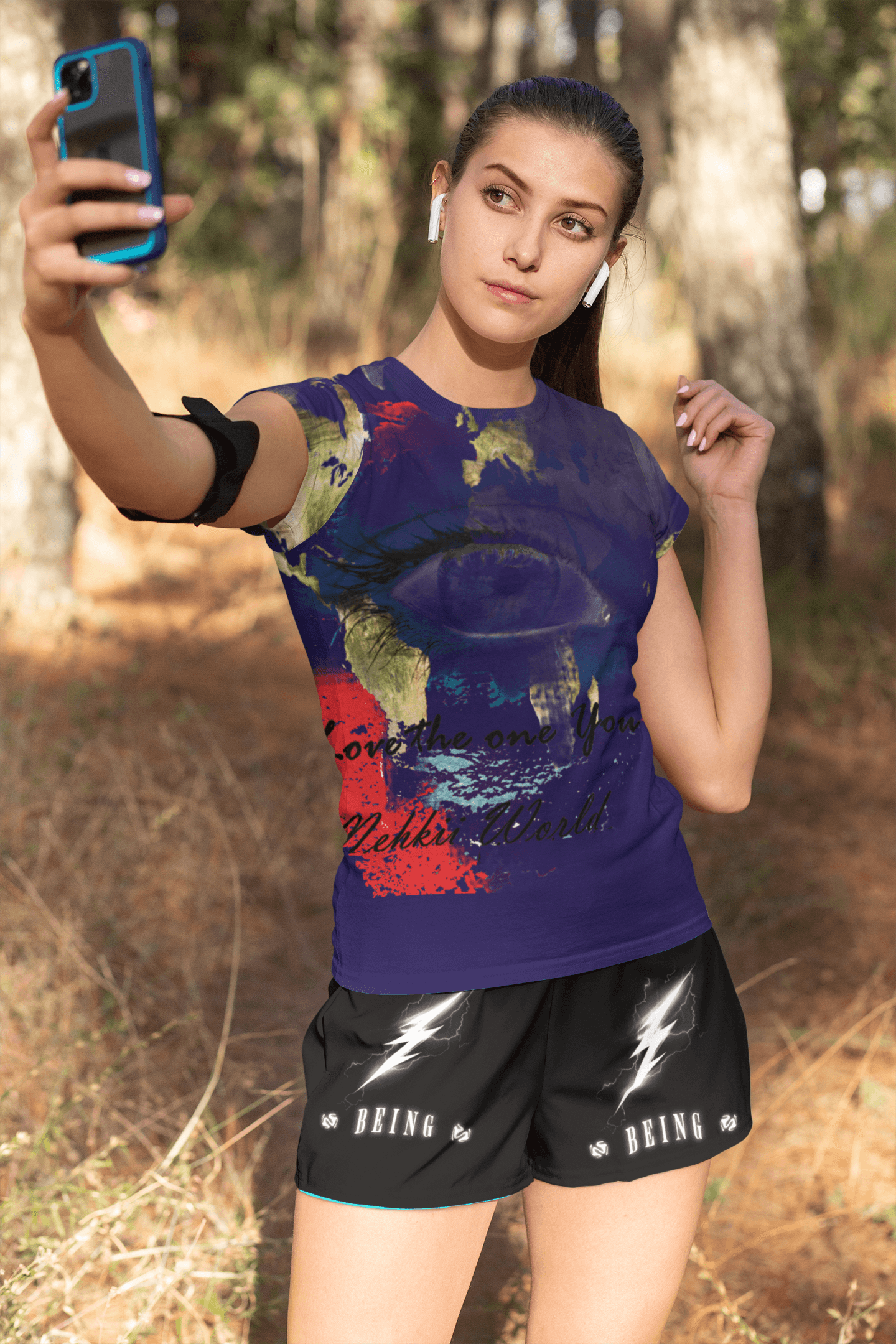 Purple Eco-friendly Women's T-shirt showcasing bold Earth face artwork, breathable cotton ideal for active days.