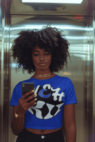 Eco-Friendly Love T-Shirt - Wear Kindness in bold blue with graphic text, promoting sustainable fashion in the T-shirts category.