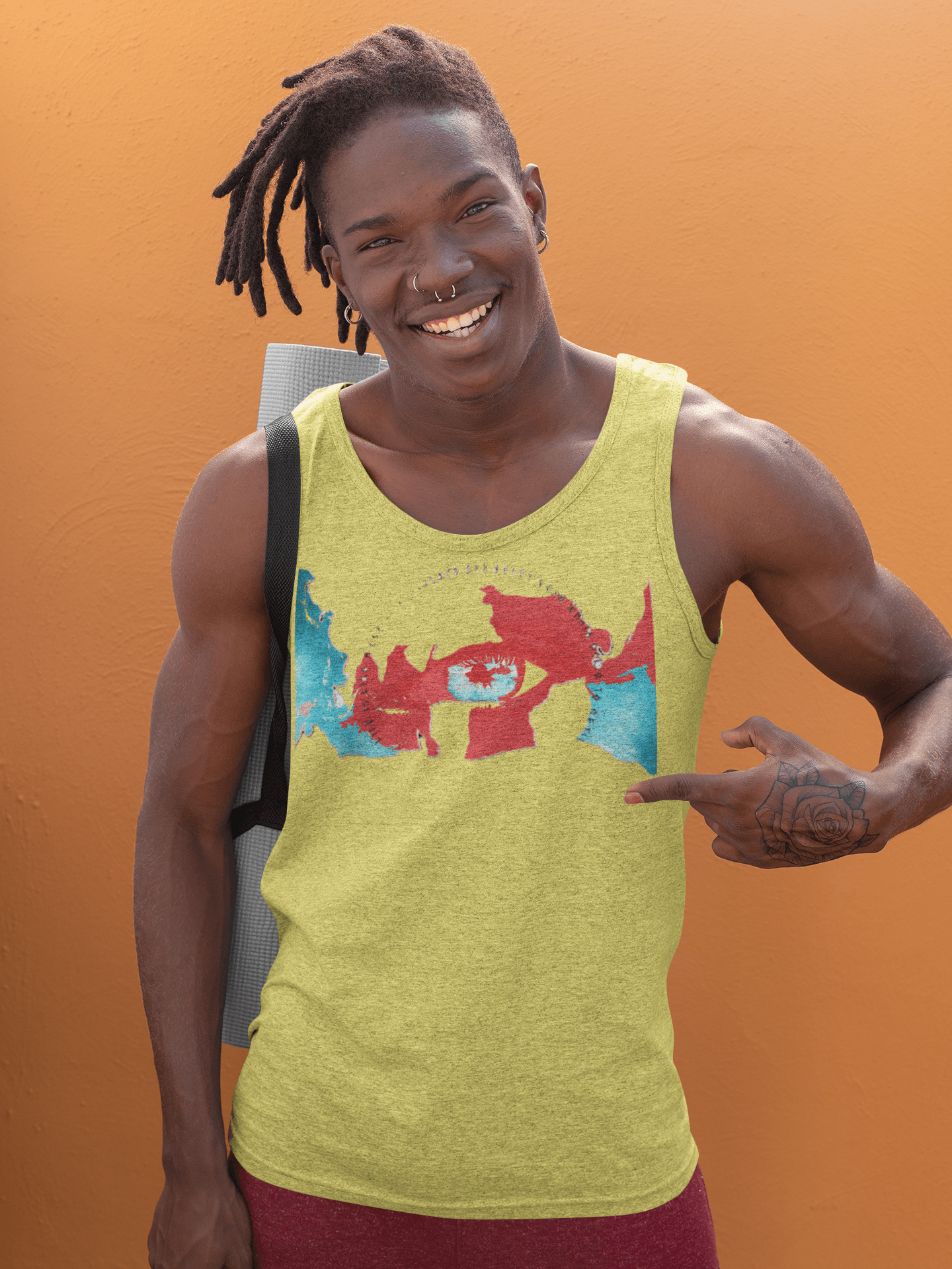 Yellow men's sustainable tank top crafted from 100% cotton with a striking red and blue eye graphic, great for eco-conscious style.