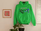 Green eco-friendly men's cotton hoodie with NEHKII graffiti design, sustainable fashion choice made from pure cotton.